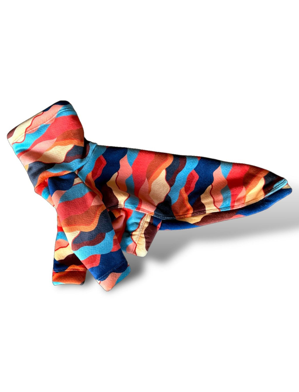 Colorful shark-shaped dog toy on a white background