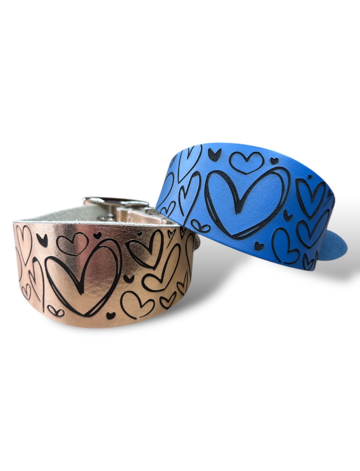 Two bracelets, one copper and one blue with heart designs, on a white background.