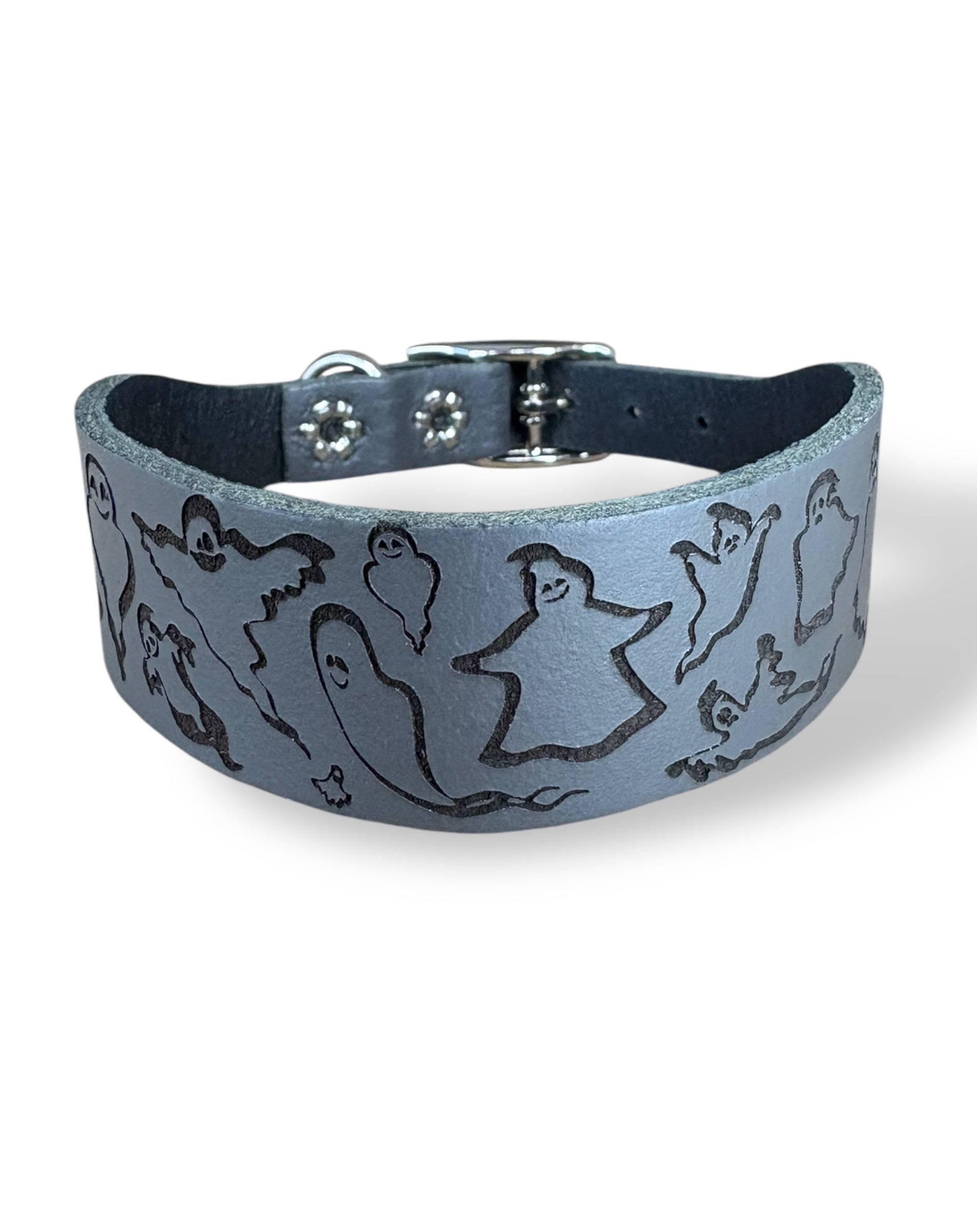 Blue leather dog collar with engraved designs on a white background