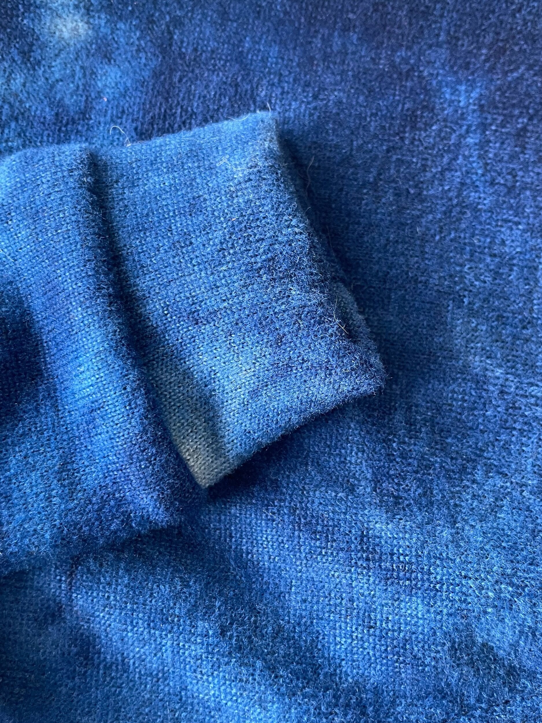 Close-up of blue fabric with a textured surface