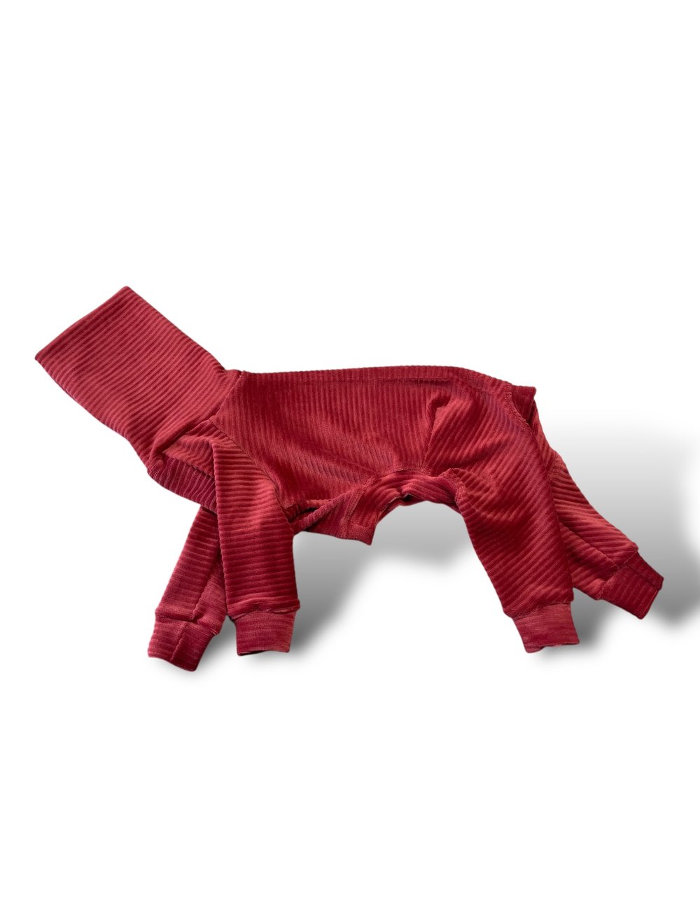 Red ribbed knit sweater on a white background