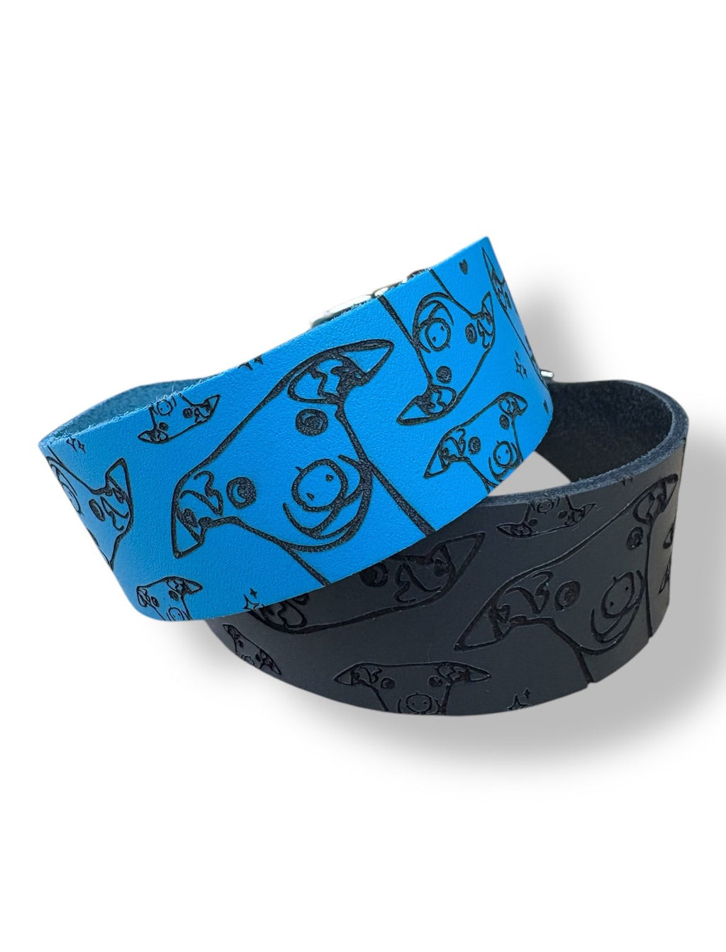 Two wristbands, one blue with a pattern and one black, on a white background.