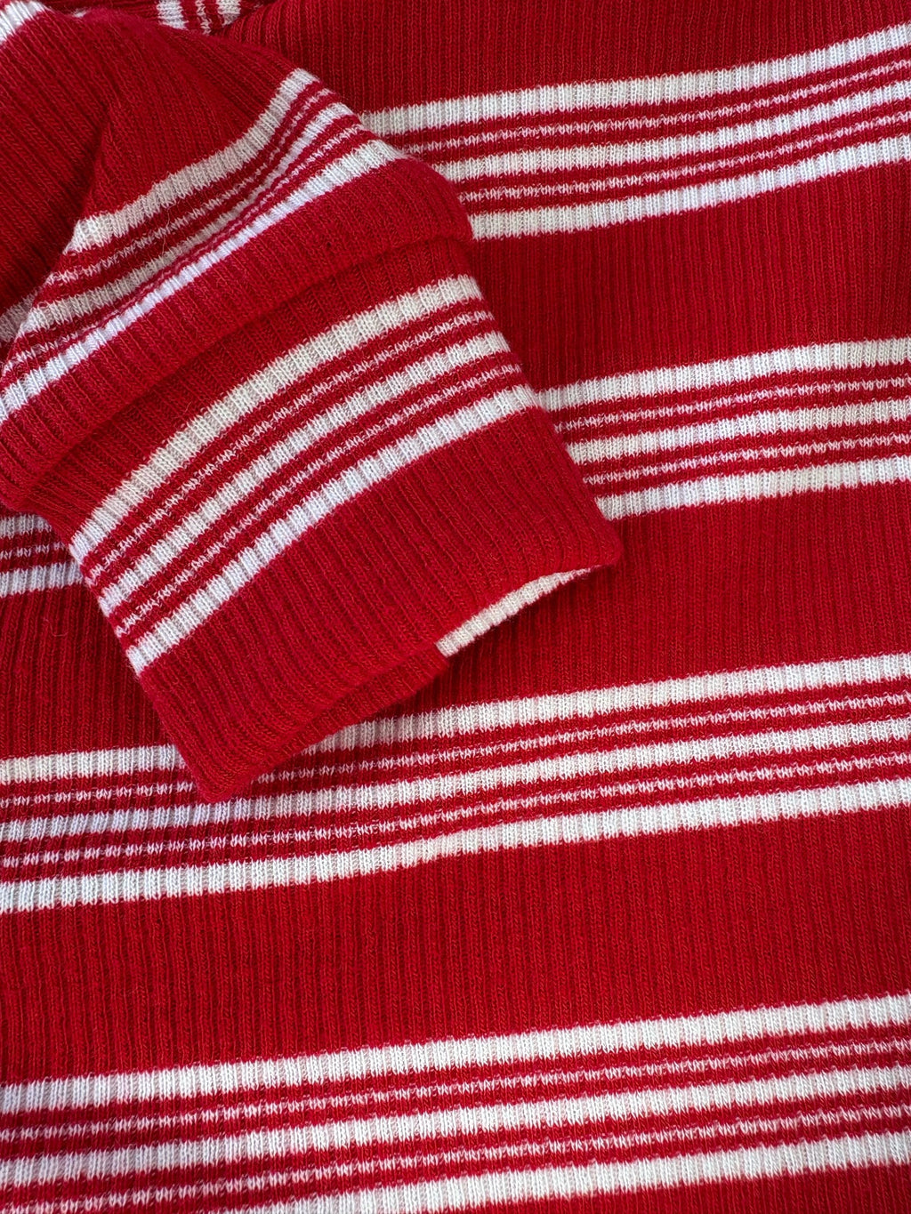 Close-up of a red and white striped fabric texture