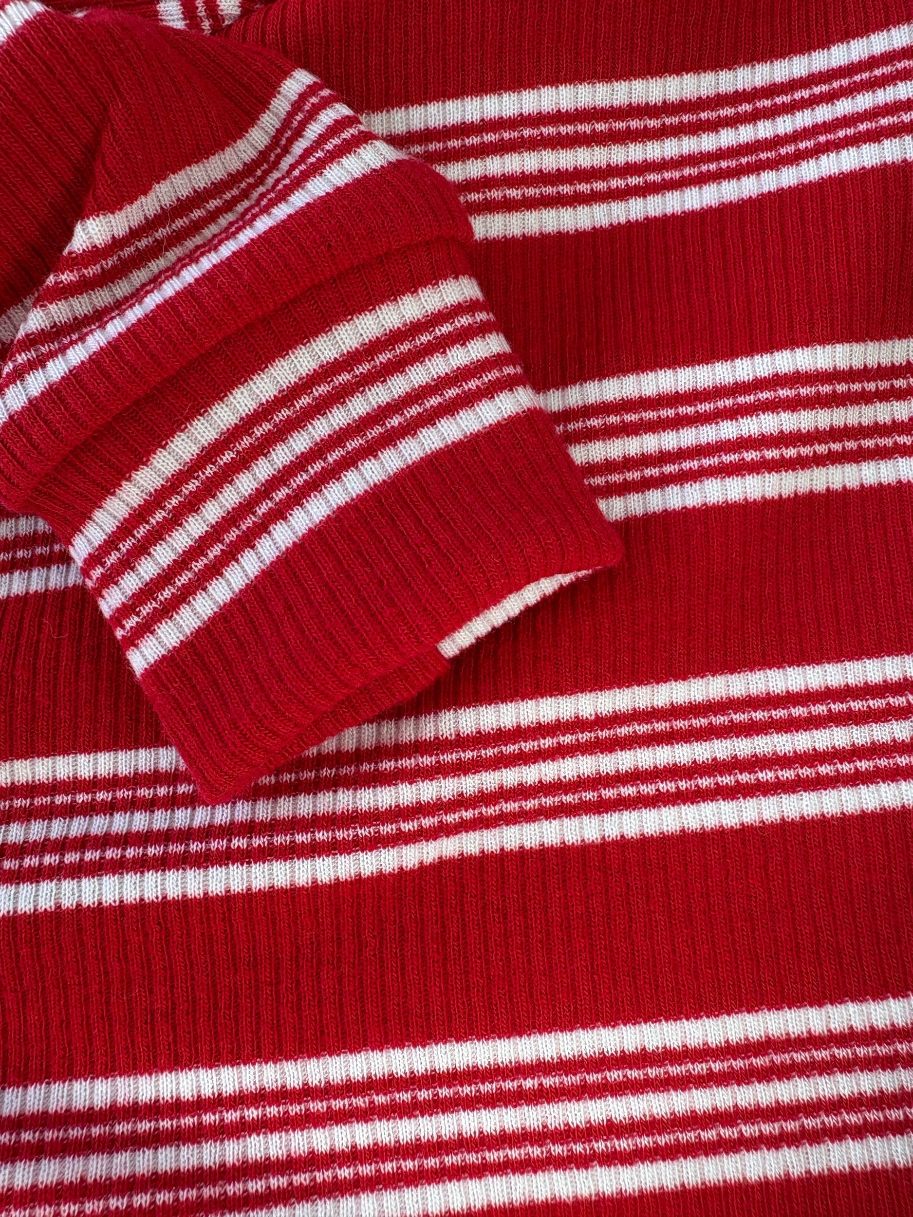 Close-up of a red and white striped fabric texture