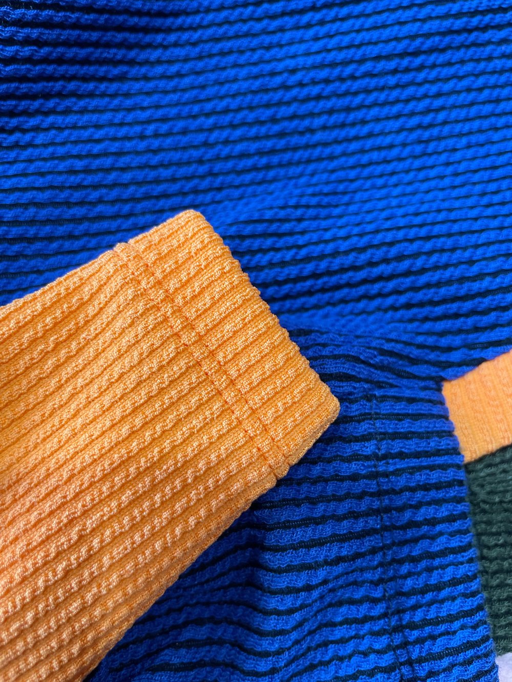 Close-up of blue and orange textured fabric