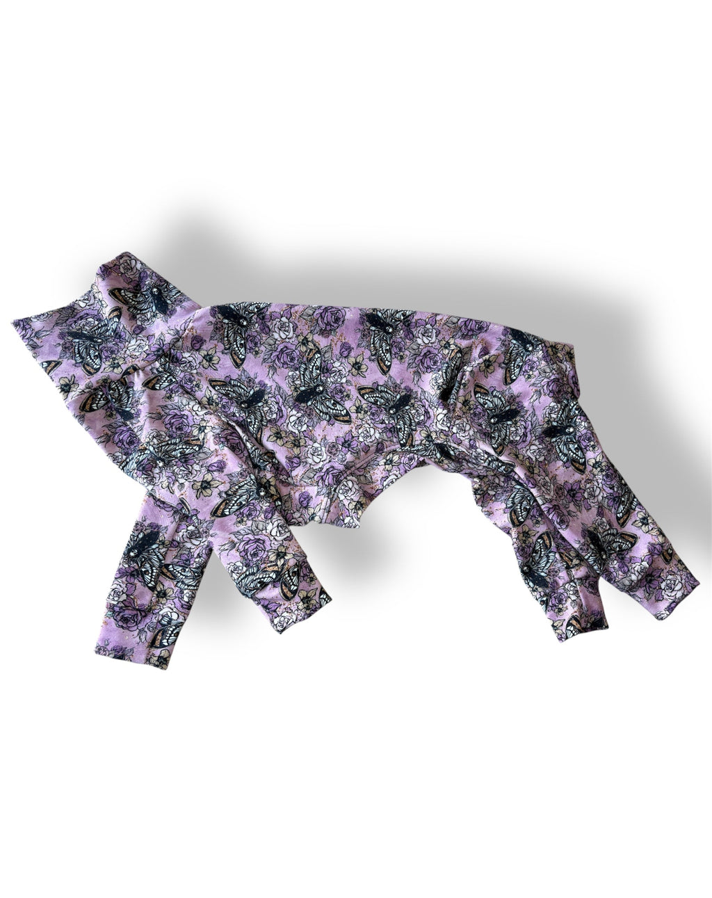 Purple floral-patterned headband on a white background