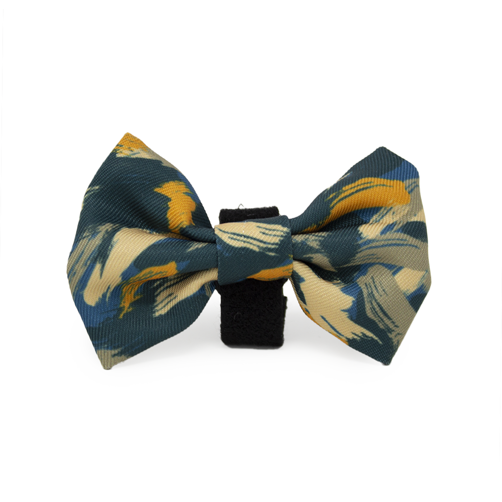 Stylish teal and yellow abstract bow tie with black strap for Brush It Off Dog Bow