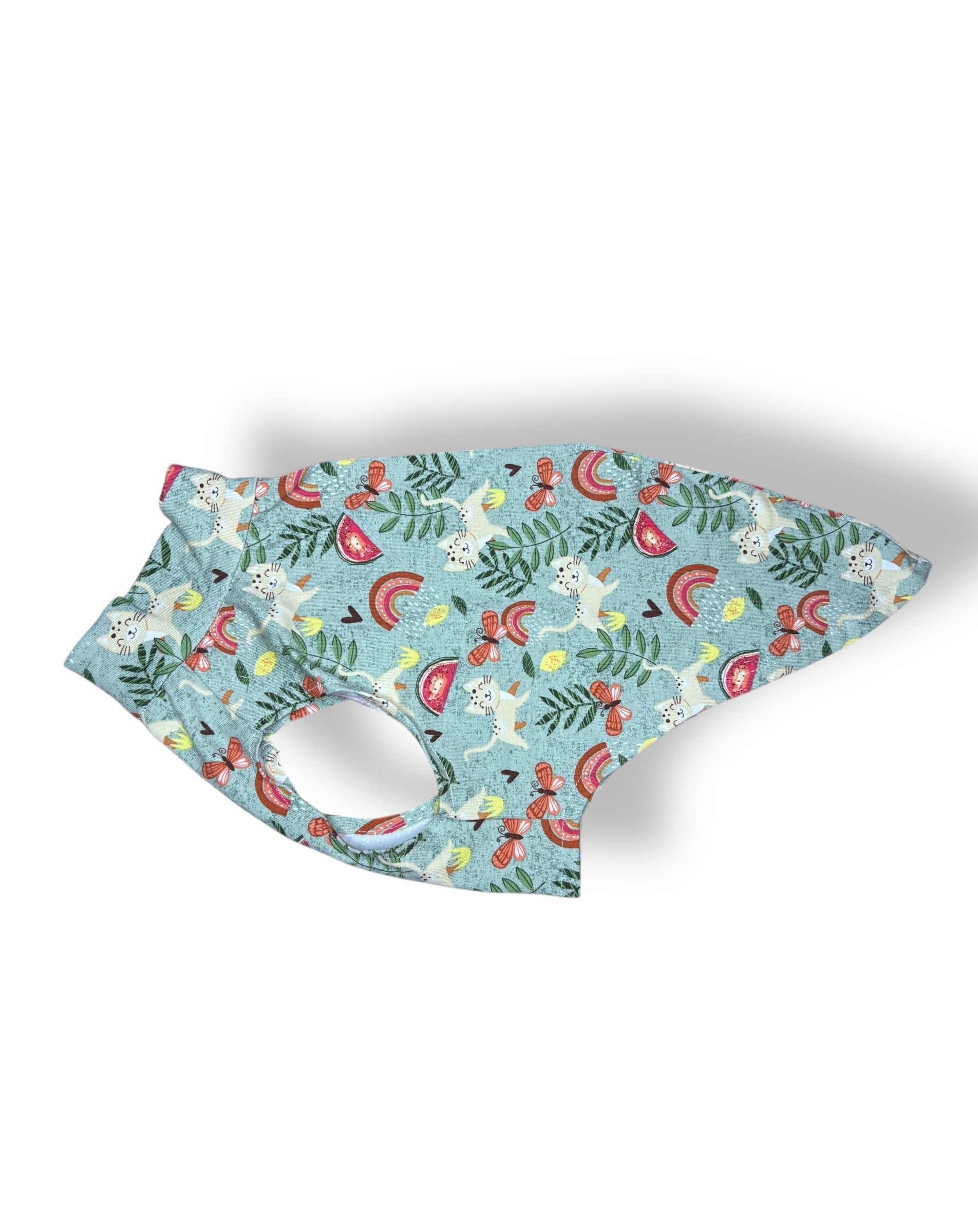 Floral-patterned dog muzzle on a white background