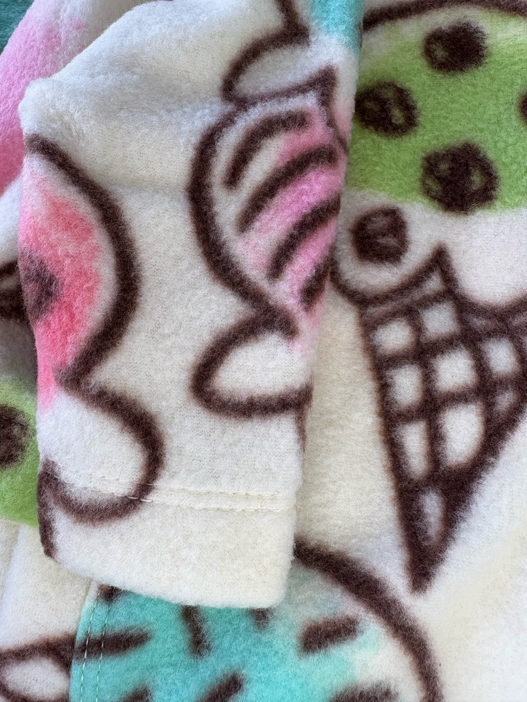 Close-up of fleece fabric with ice cream cone pattern