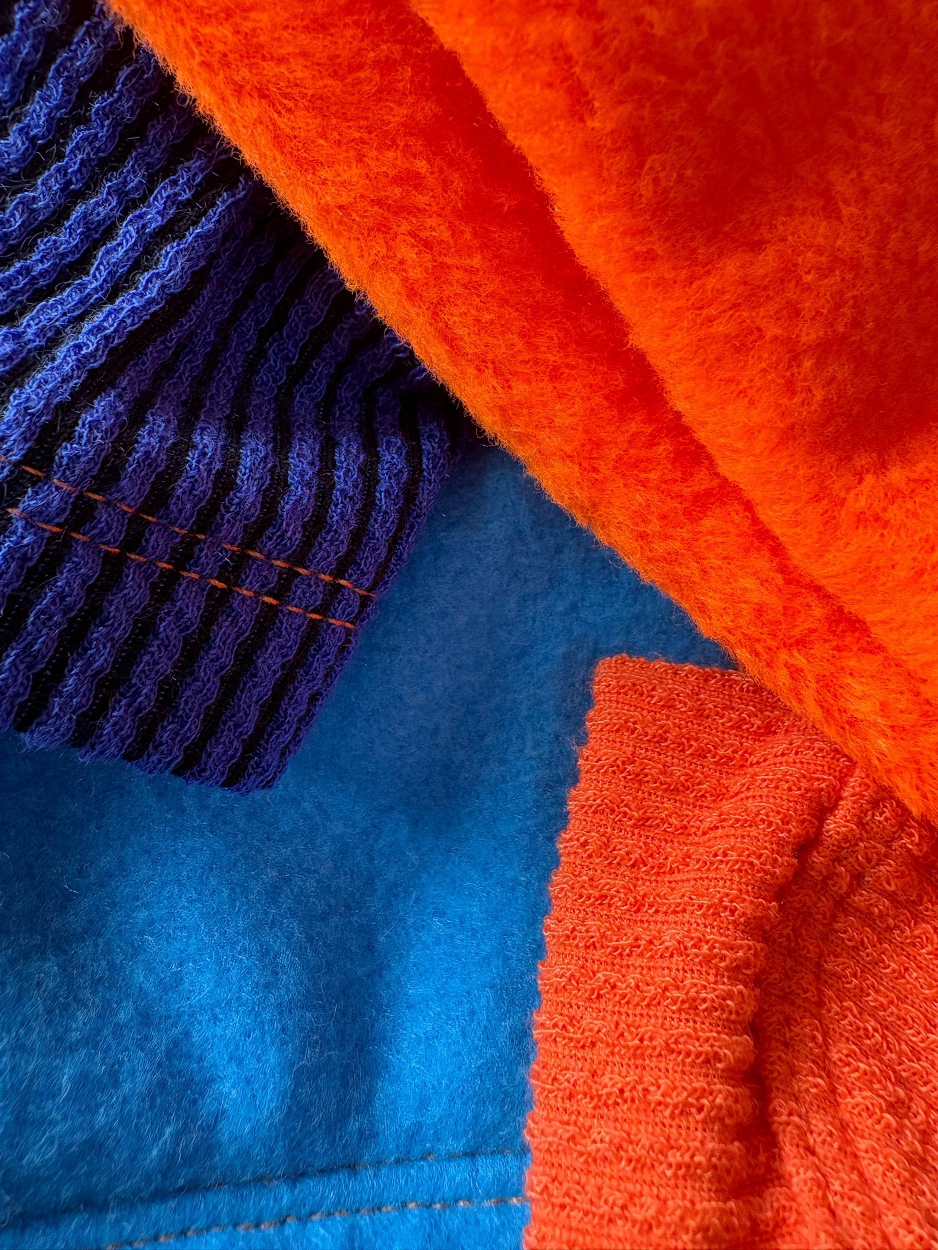 Close-up of orange and blue fabric textures