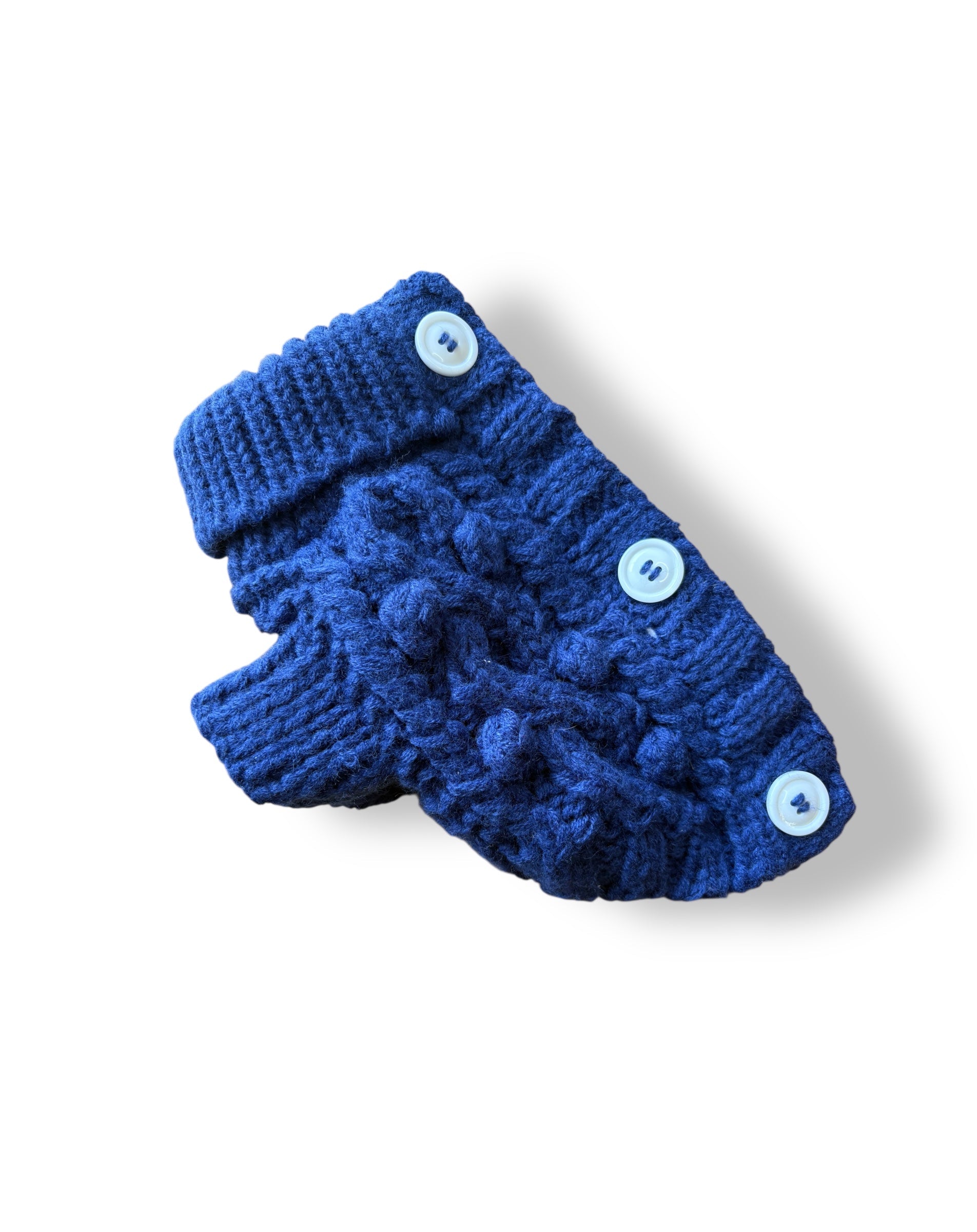 Blue knitted pet sweater with buttons on a white background