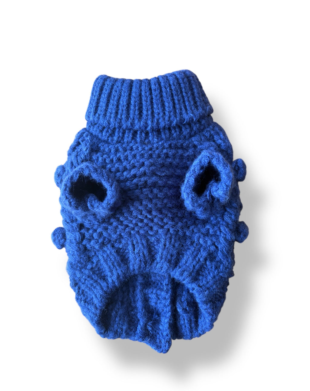 Blue knitted dog sweater on a white background