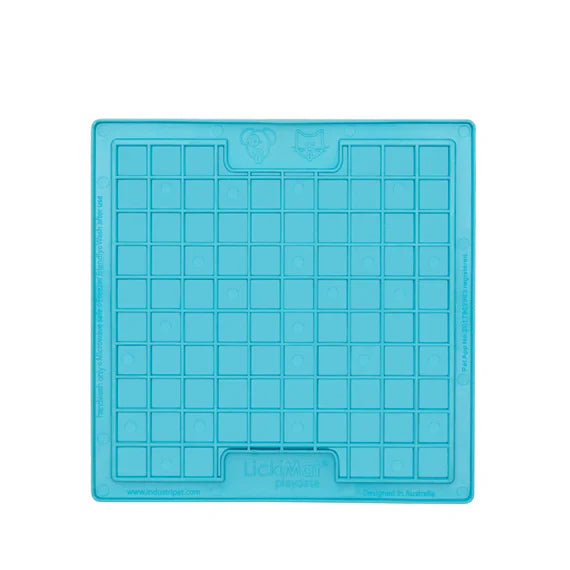 Blue silicone mold with grid pattern on a white background