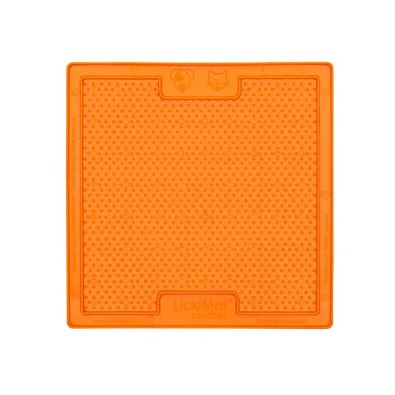 Orange mat with textured surface on a white background