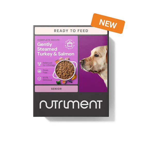 Dog food package by Nutriment with a purple label and orange 'New' tag on a white background