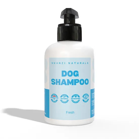 Bottle of Shanzi Naturals dog shampoo on a white background