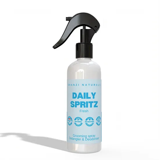 White spray bottle labeled 'Daily Spritz' on a white background