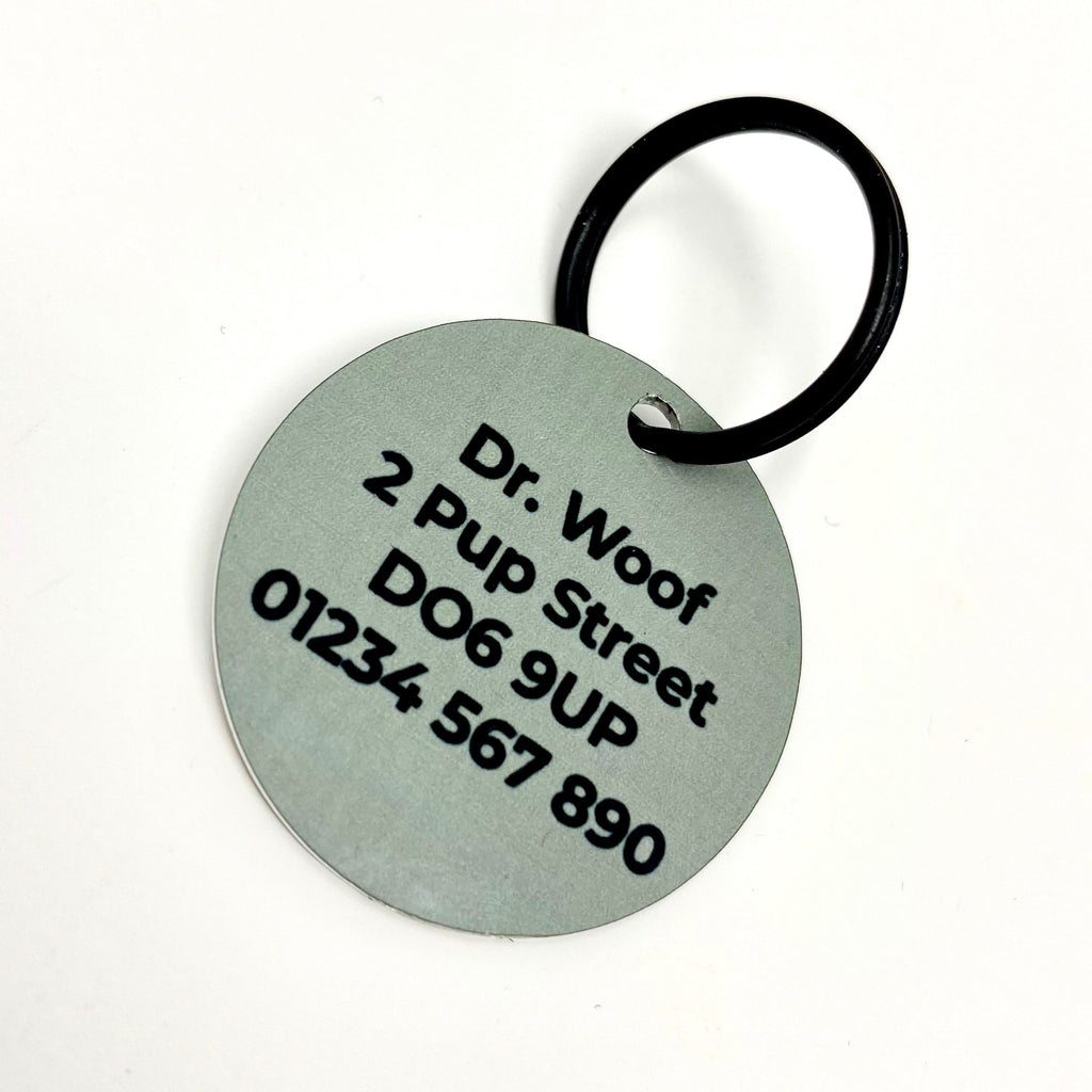 Silver circular pet ID tag with black engraving on Steel Leopard khaki-grey dog collar