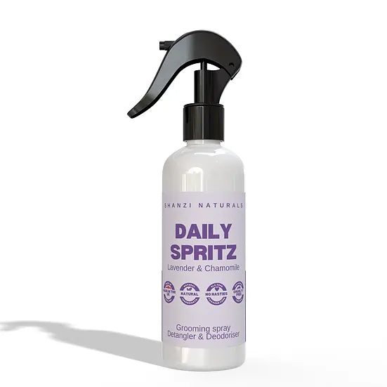 Shanzi Naturals Daily Spritz grooming spray bottle on a white background
